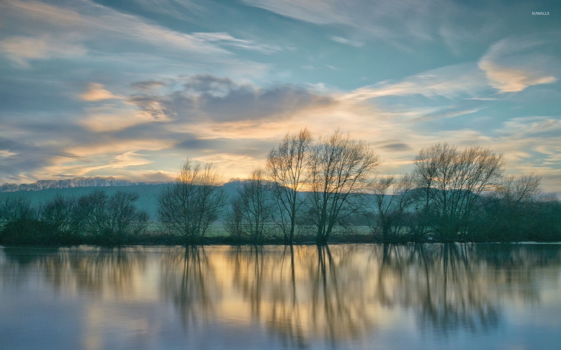 A Calm Lake At Sunset Wallpapers