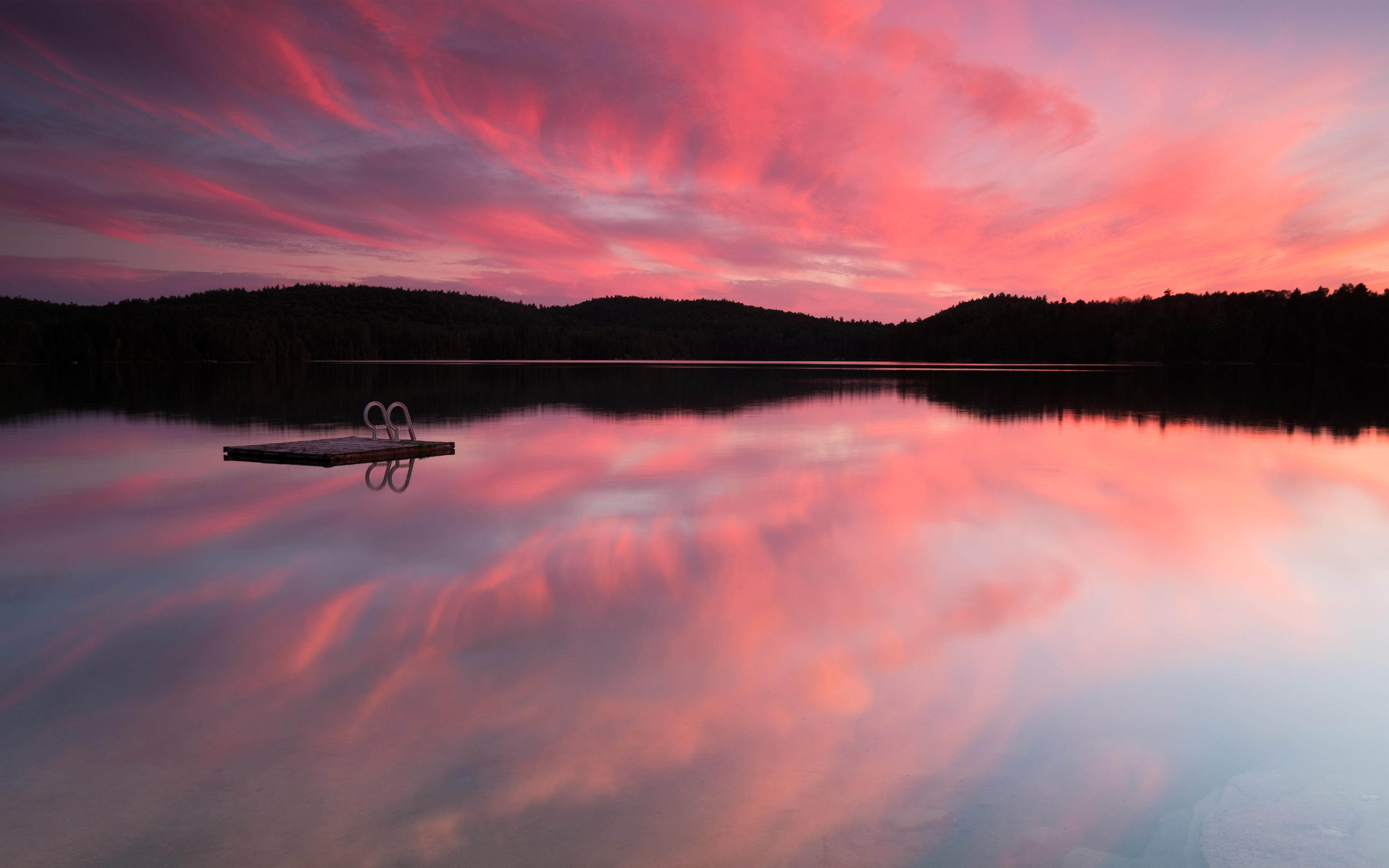 A Calm Lake At Sunset Wallpapers
