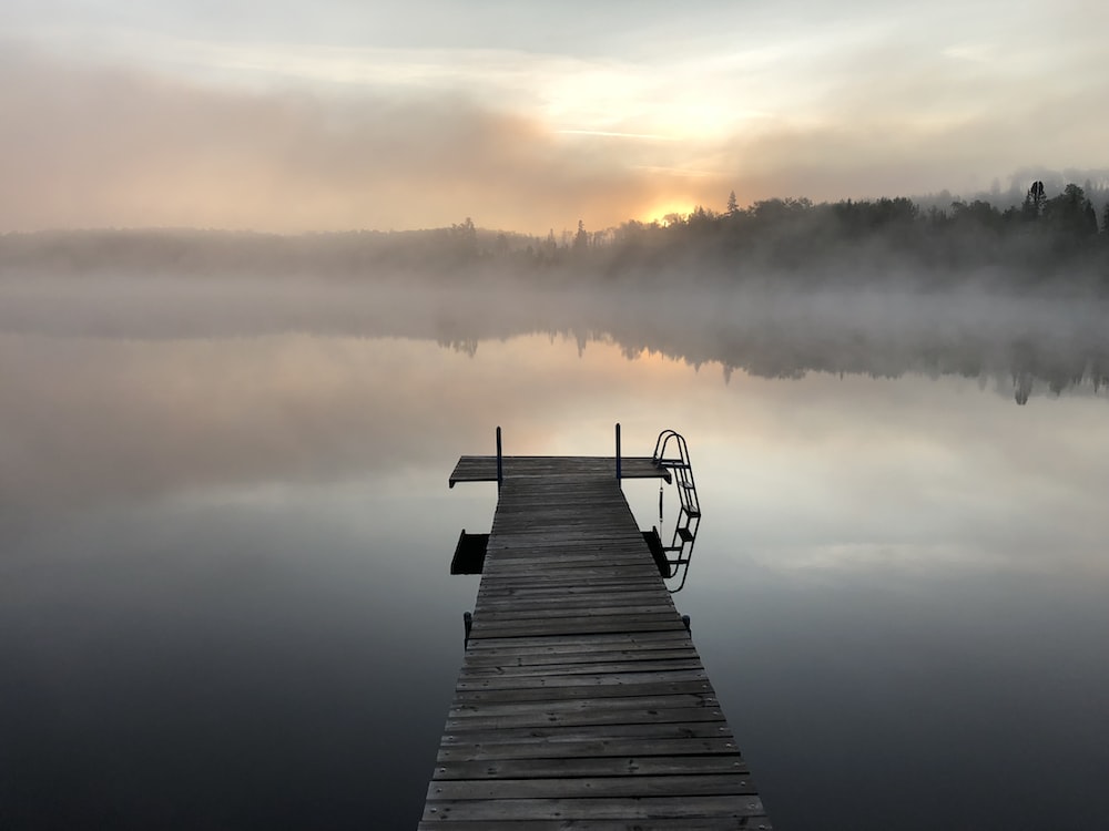 A Calm Lake At Sunset Wallpapers