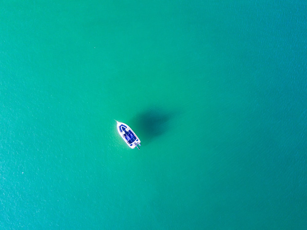 Alone Boat In The Sea Wallpapers