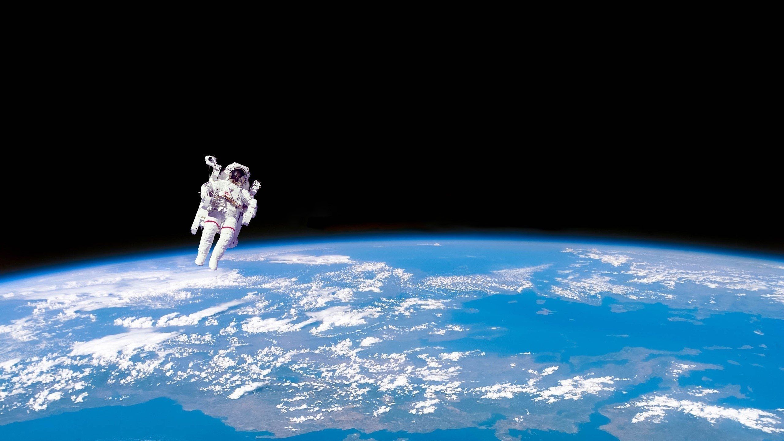 Astronaut Flying In The Space 5K Wallpapers