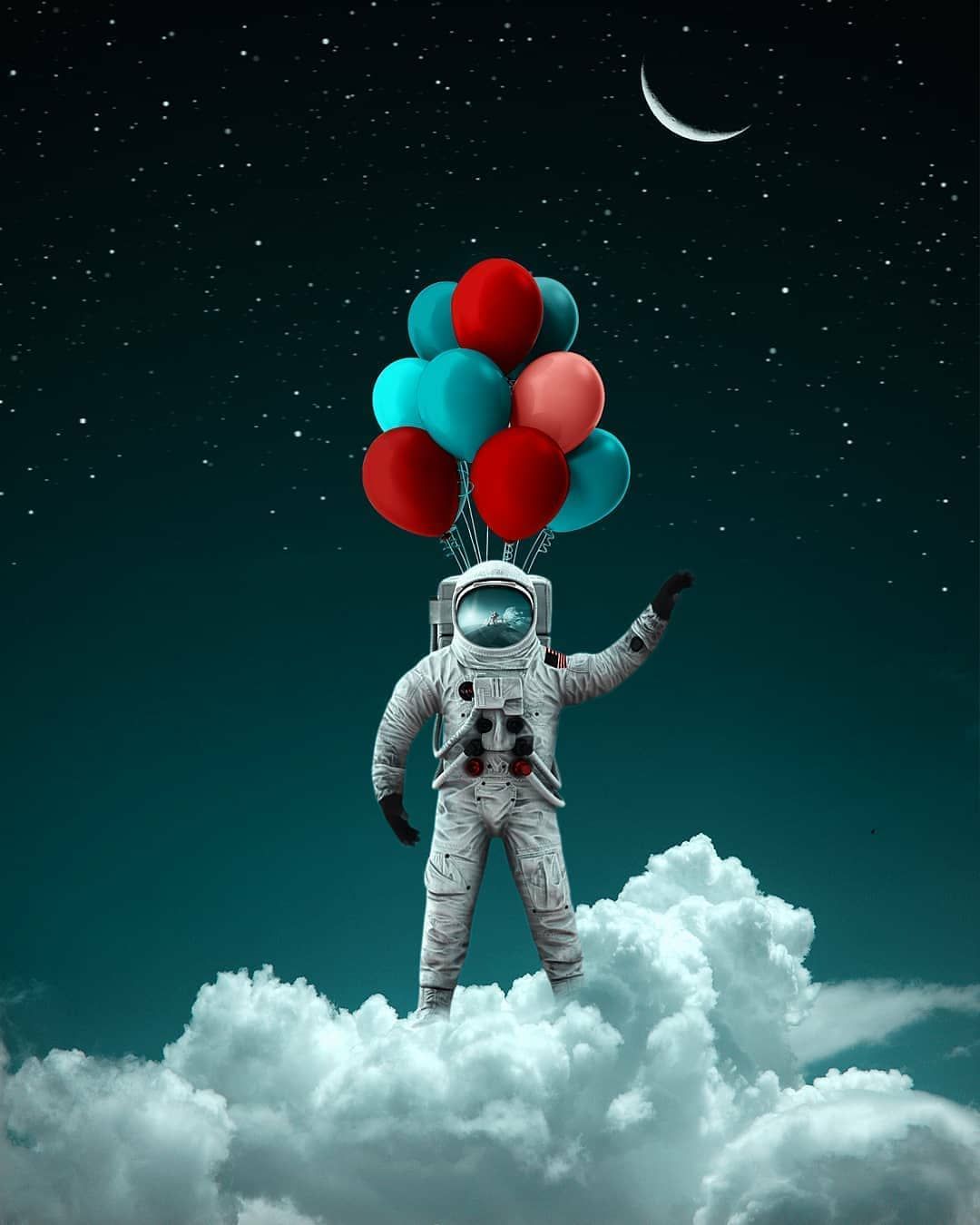 Astronaut Holding Of Colorful Balloons Wallpapers