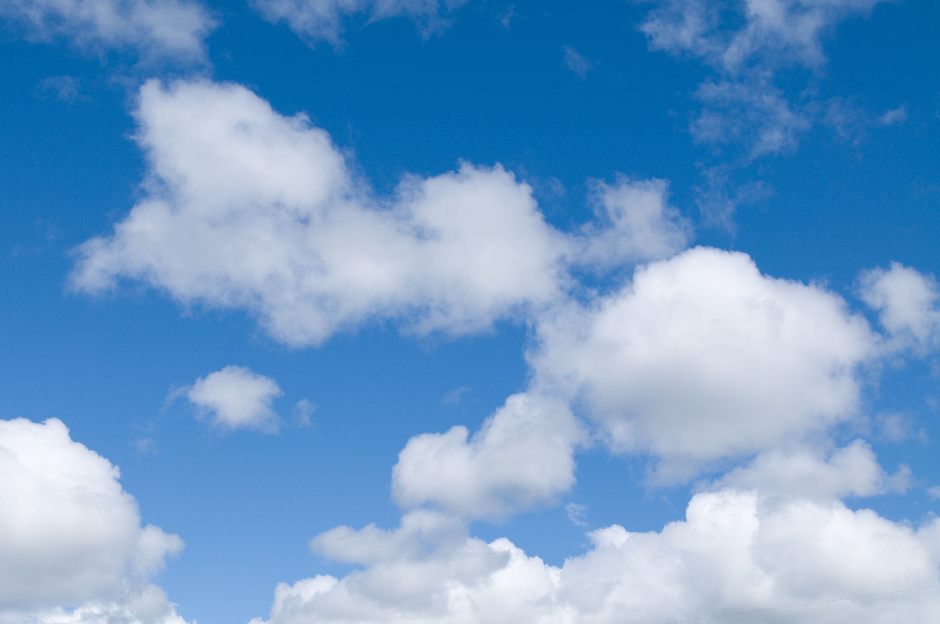 Blue Sky With Clouds Background