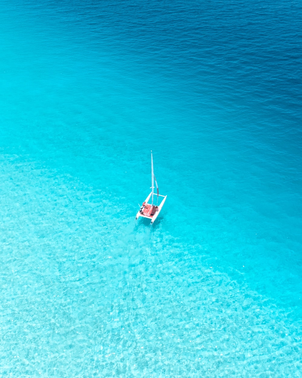 Boat In Blue Sea Water Wallpapers