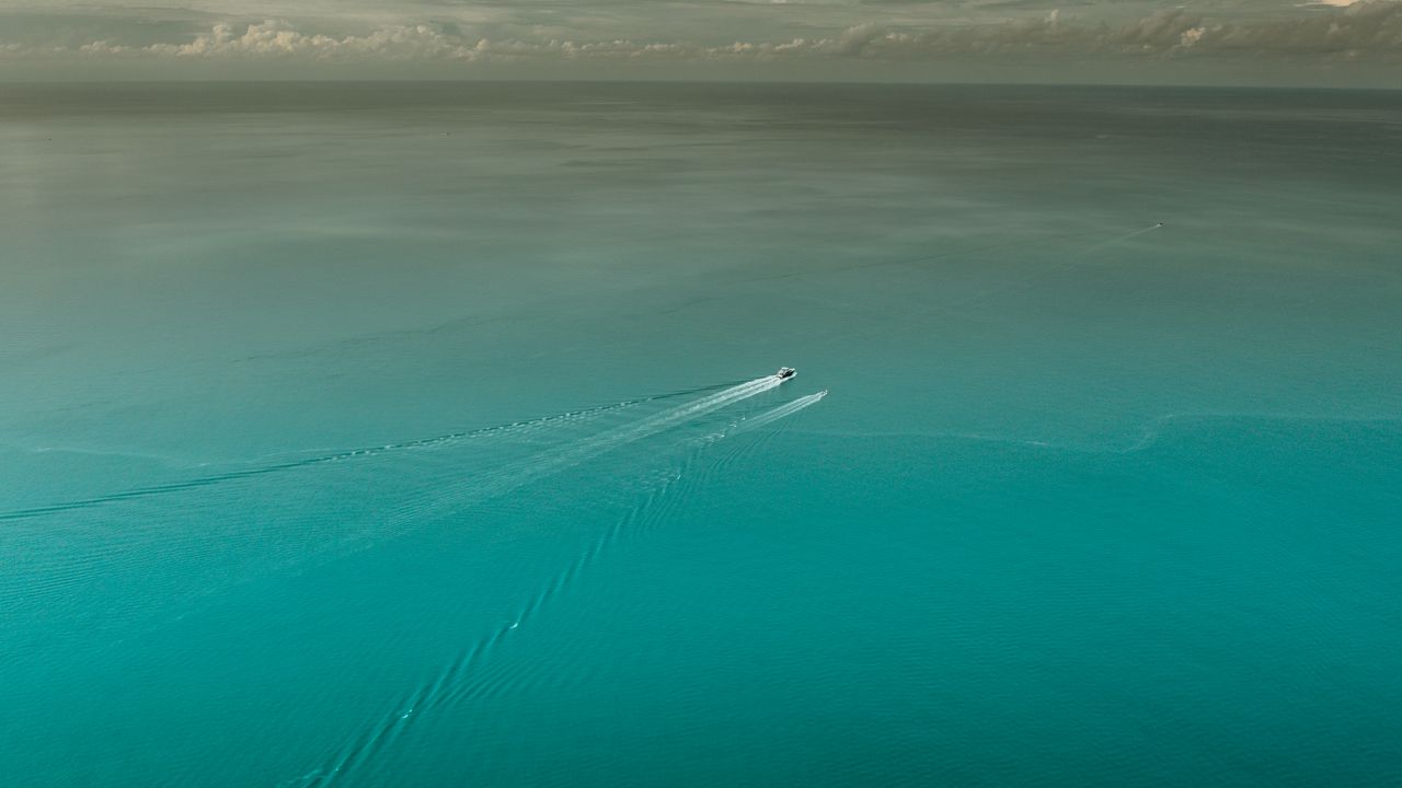 Boat In Blue Sea Water Wallpapers