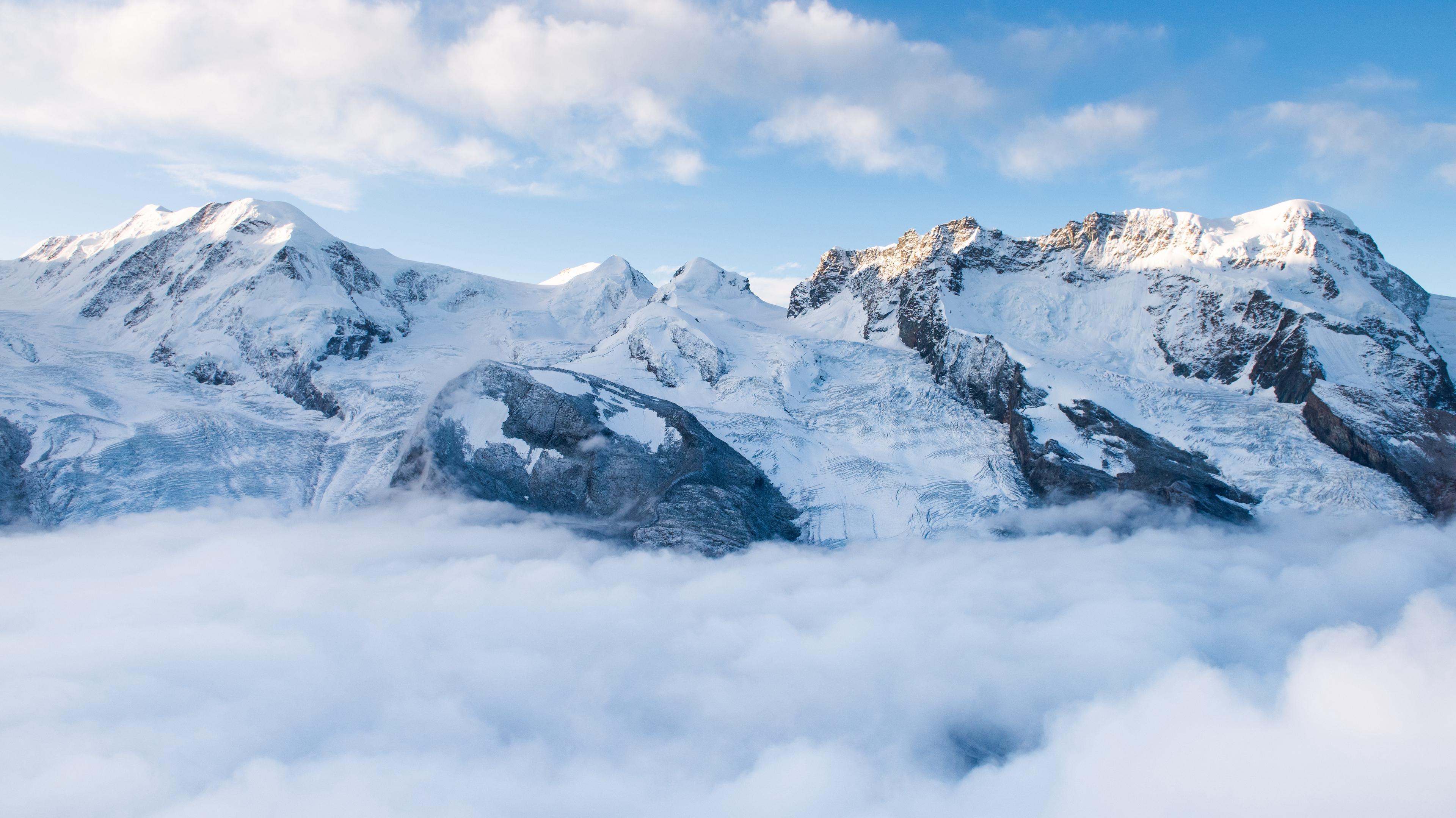 Cloudy Mountains 4K Wallpapers