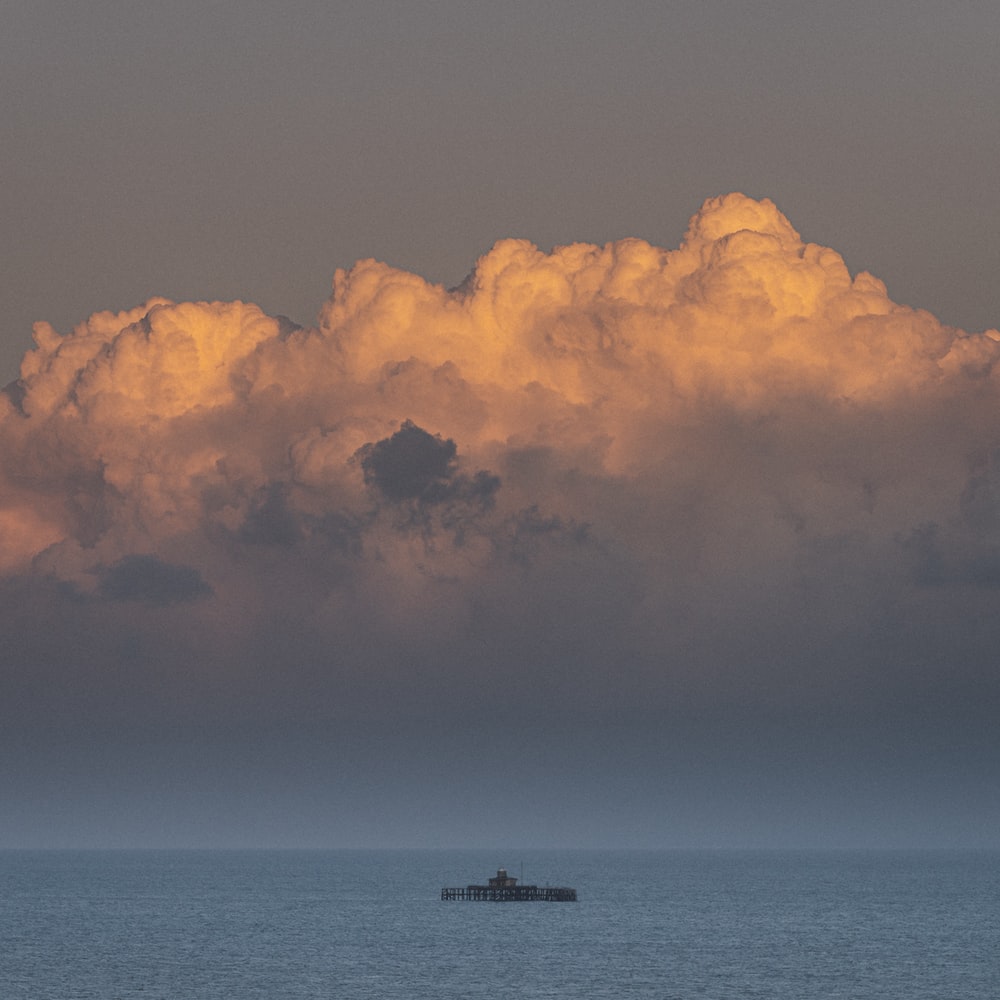 Dark Evening Blue Cloudy Alone Boat In Ocean Wallpapers