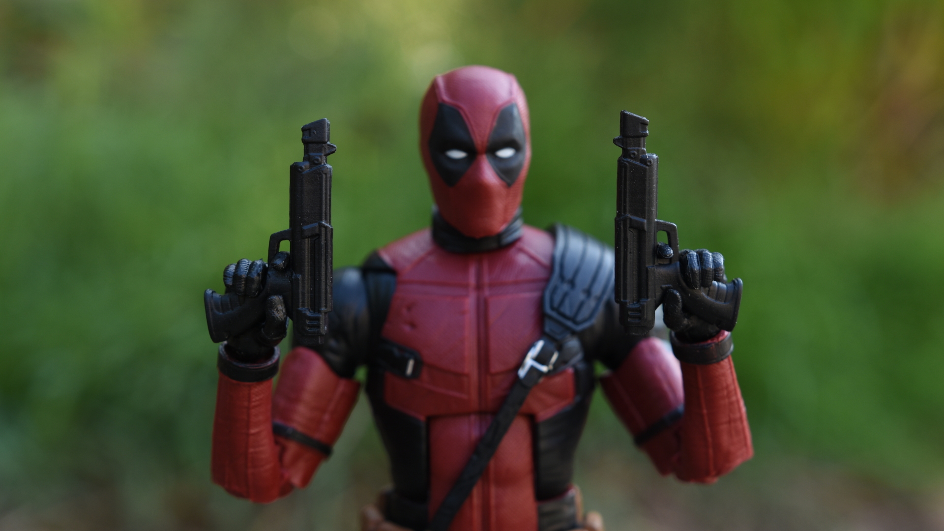 Deadpool With Guns Up Wallpapers