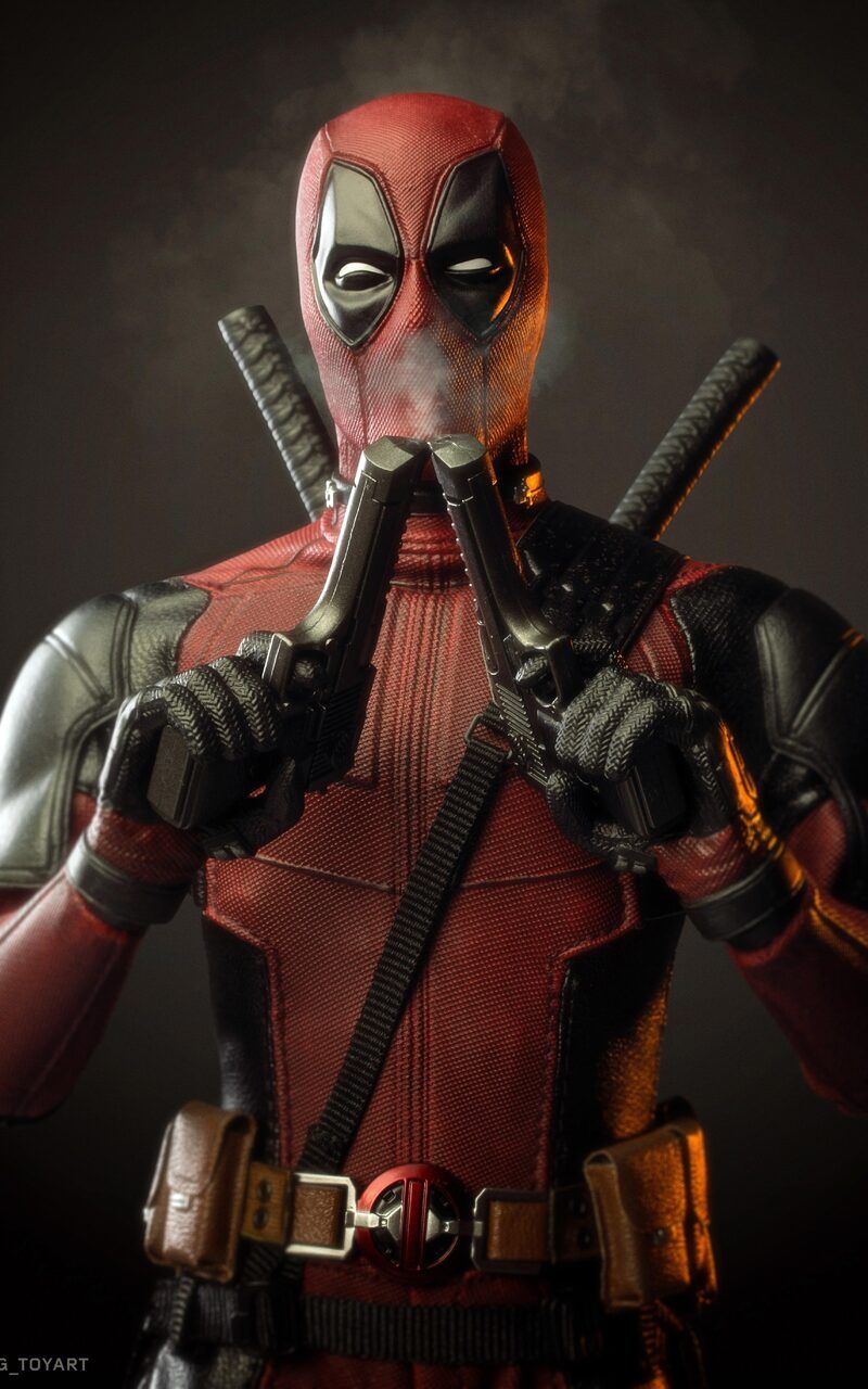 Deadpool With Guns Up Wallpapers