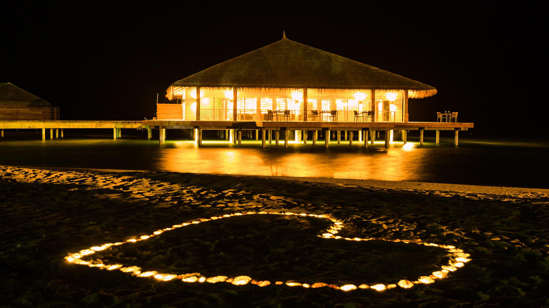 Dining On The Beach At Night In The Maldives Ocean Wallpapers