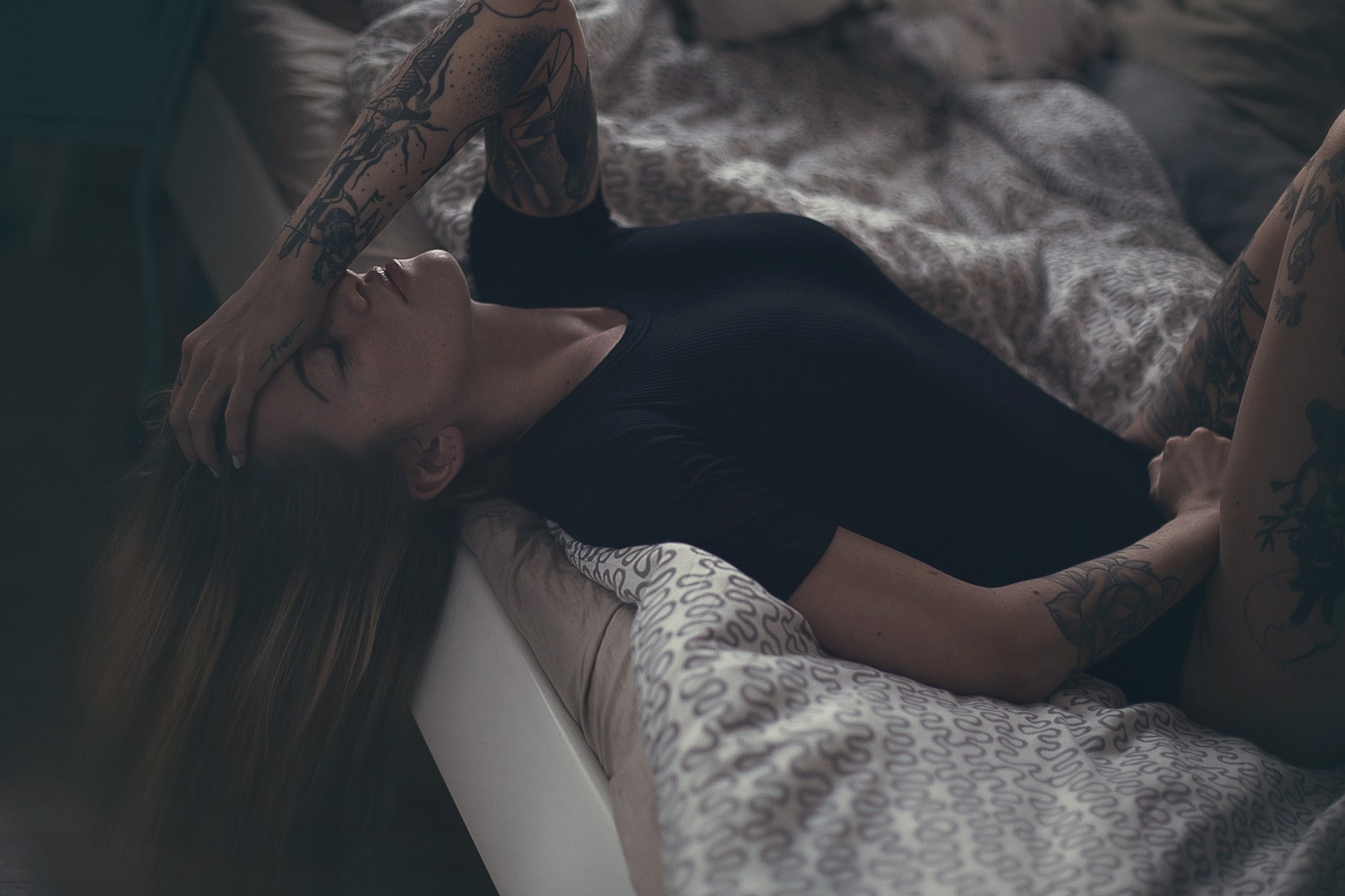 Girl Lying On Bed Legs Up Wallpapers