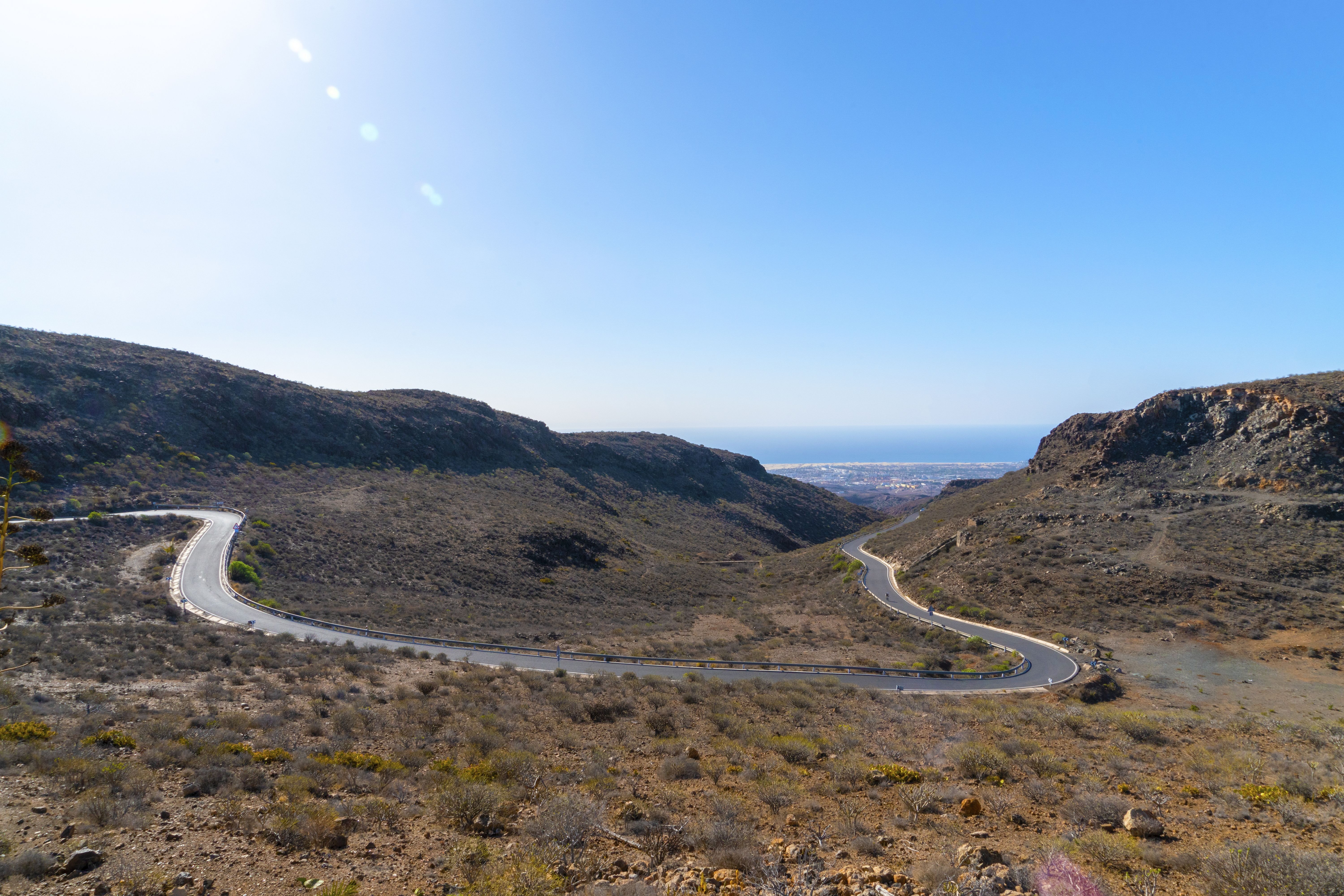 Grass Covered Mountain Road Wallpapers