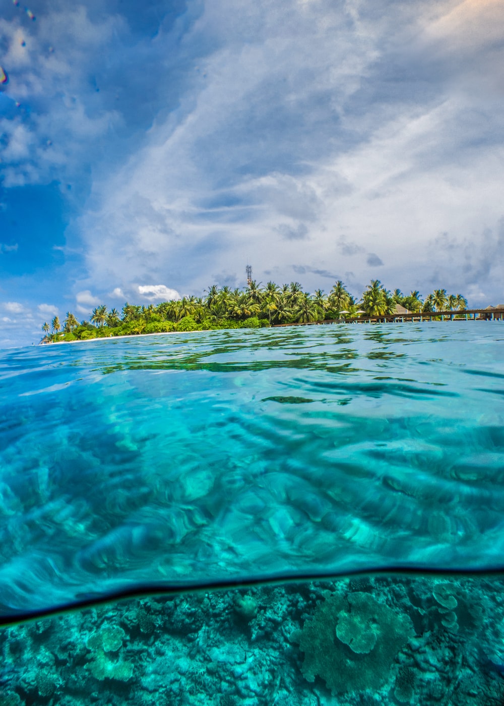 Island Surrounded By Green Sea Wallpapers