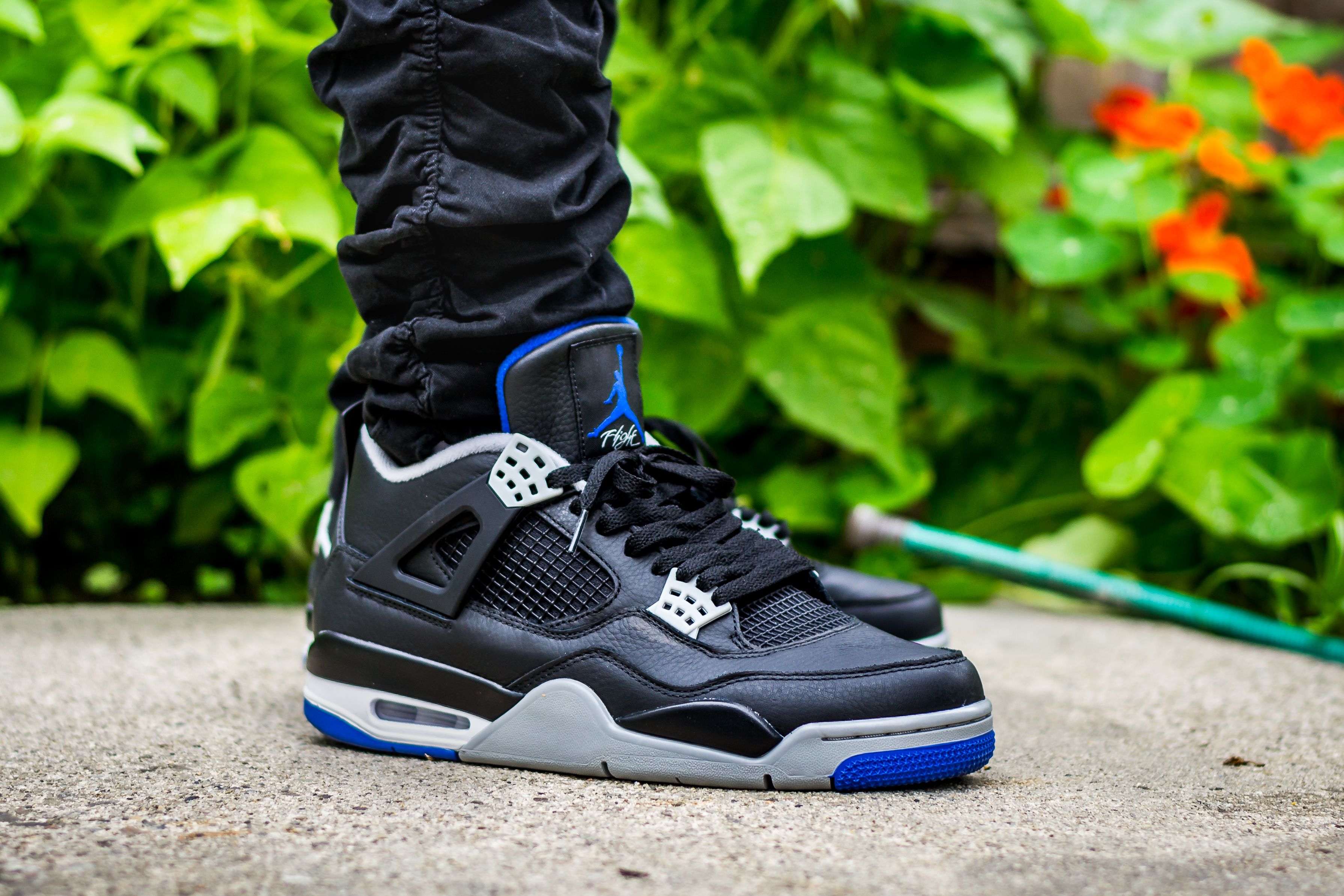 Jordan 4 Motorsport Alternate On Feet Wallpapers