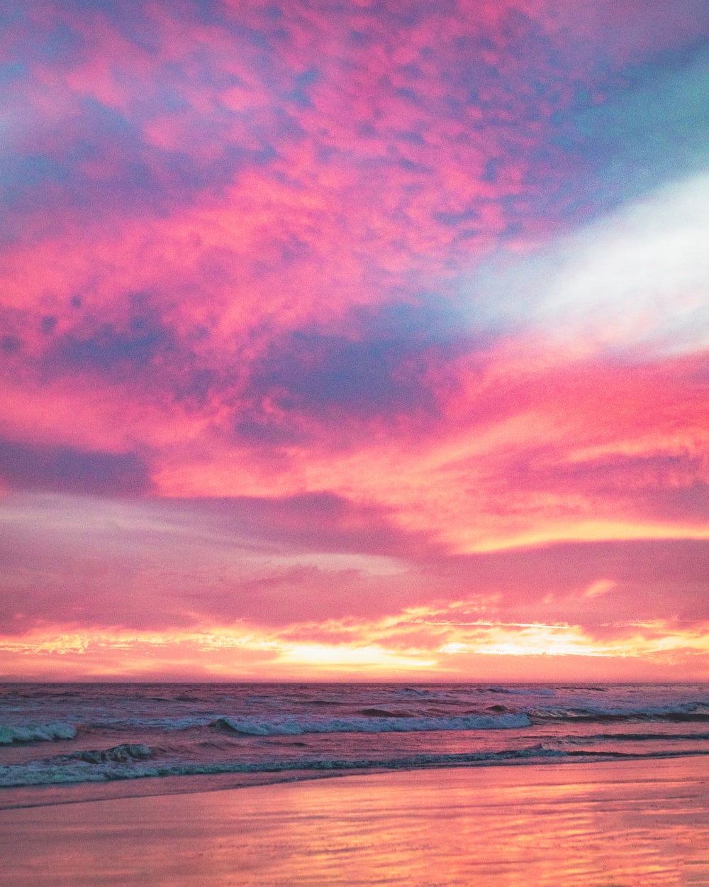 Reflection Of Cloudy Sunset Over Beach Wallpapers