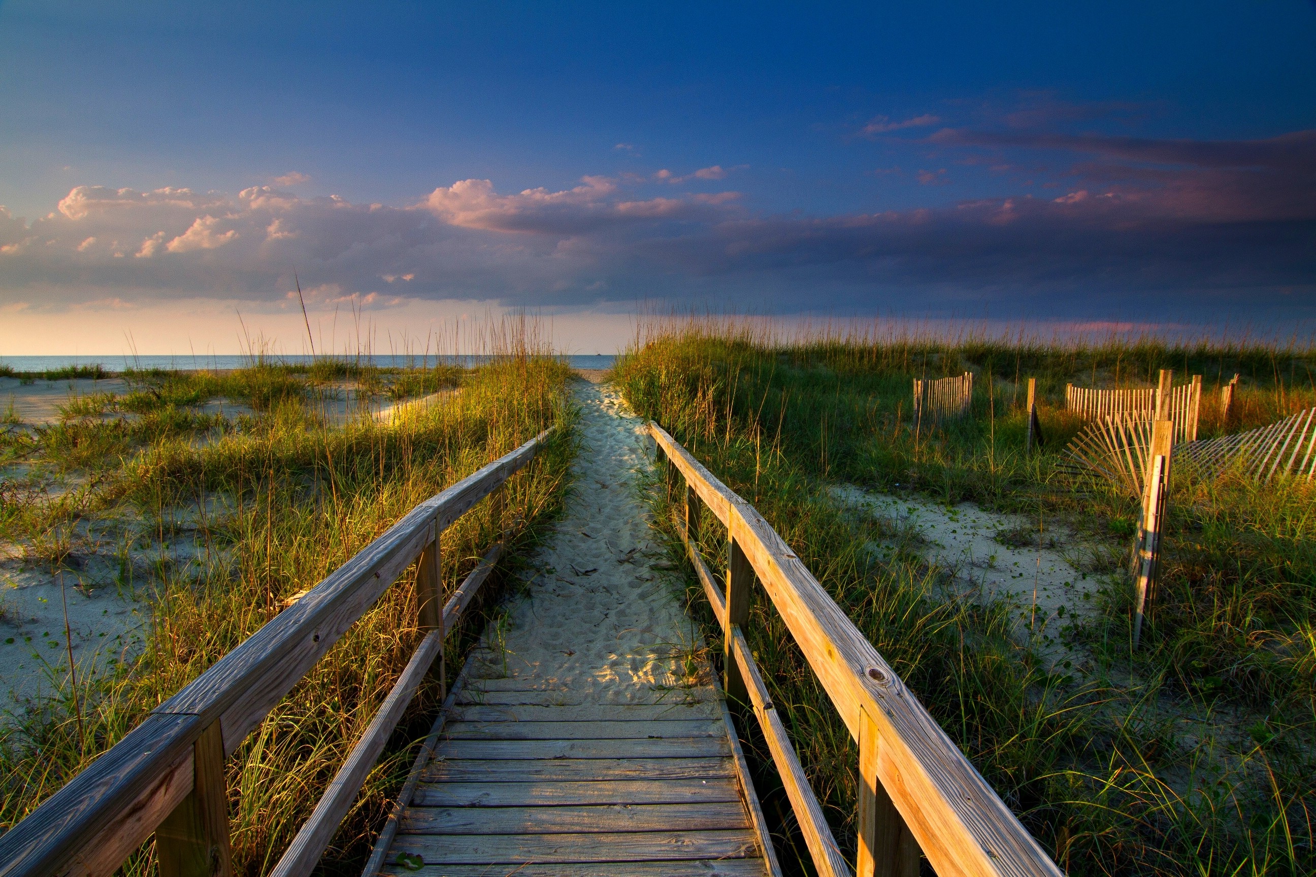 Sand And Pathway To Sea Under Cloudy Sunset Wallpapers