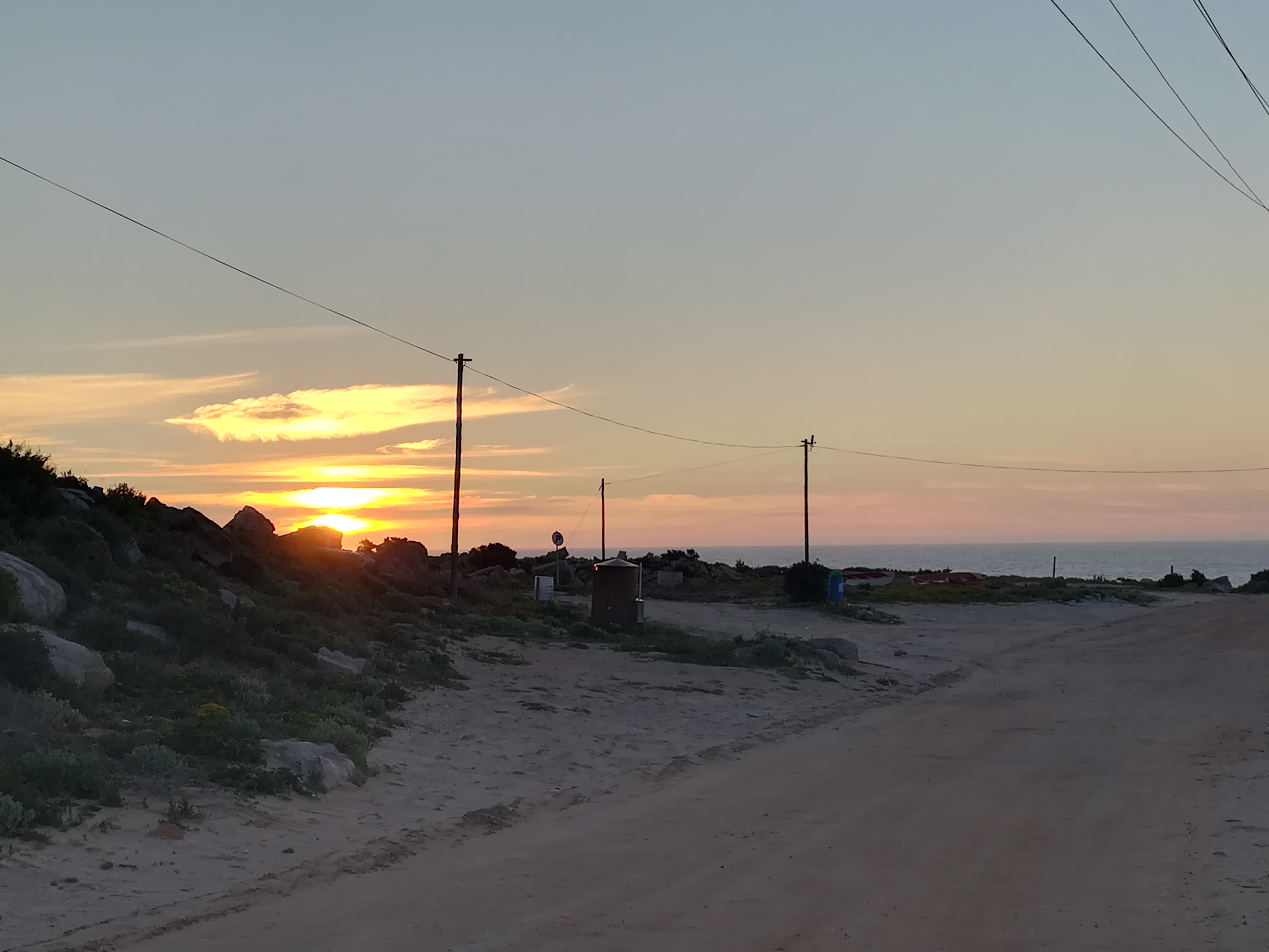 Sand And Pathway To Sea Under Cloudy Sunset Wallpapers