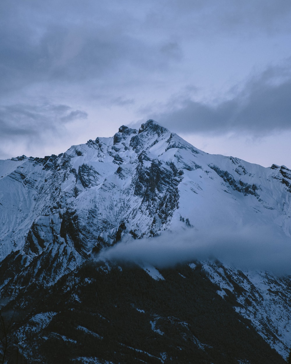 Snow Covered Mountains Under Black Cloudy Sky Wallpapers
