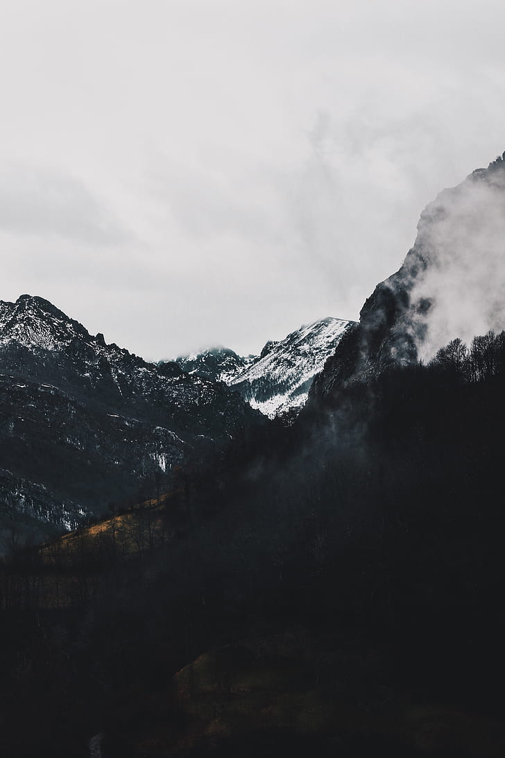 Snow Covered Mountains Under Black Cloudy Sky Wallpapers