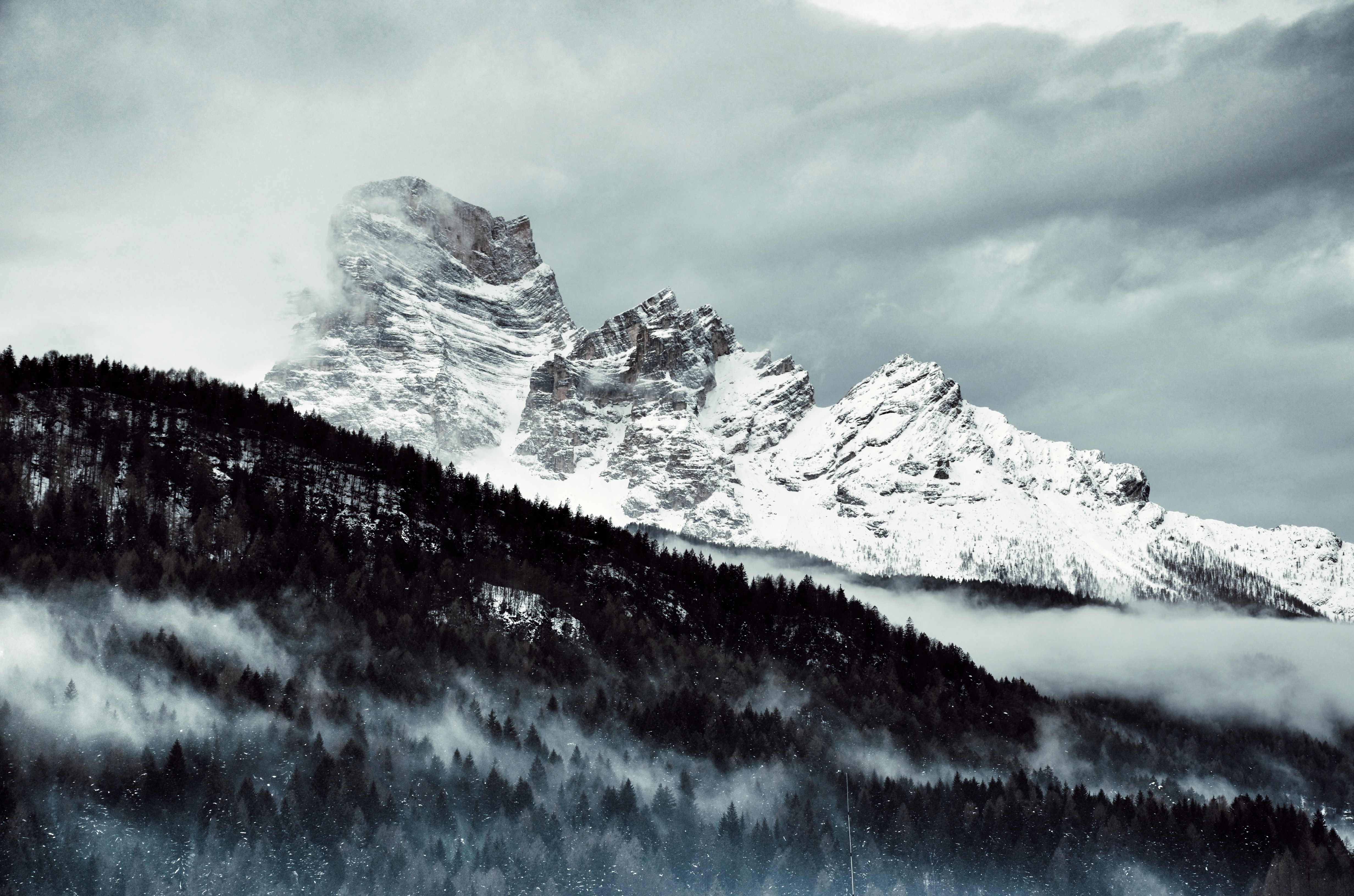 Snow Covered Mountains Under Black Cloudy Sky Wallpapers