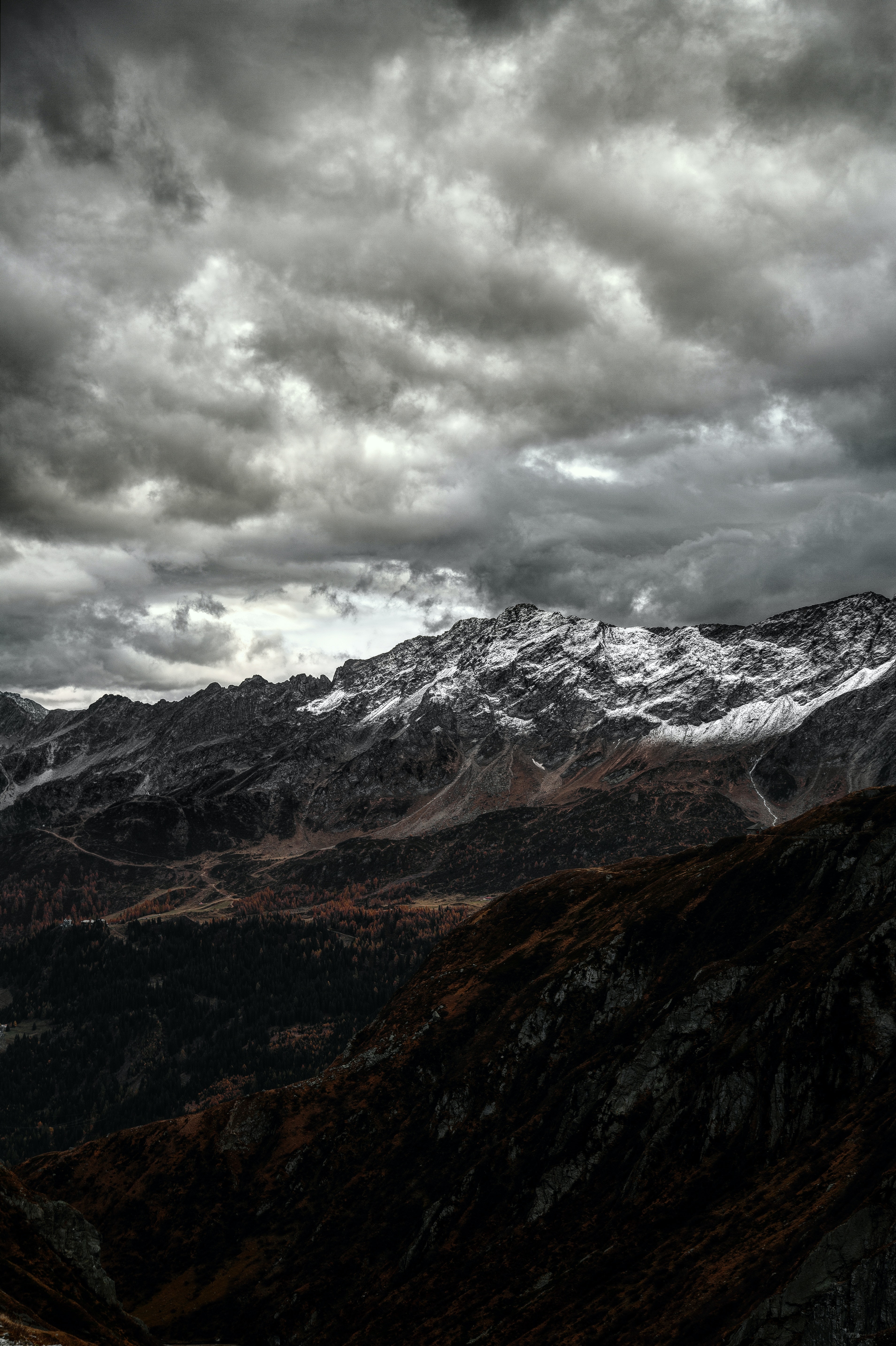 Snow Covered Mountains Under Black Cloudy Sky Wallpapers