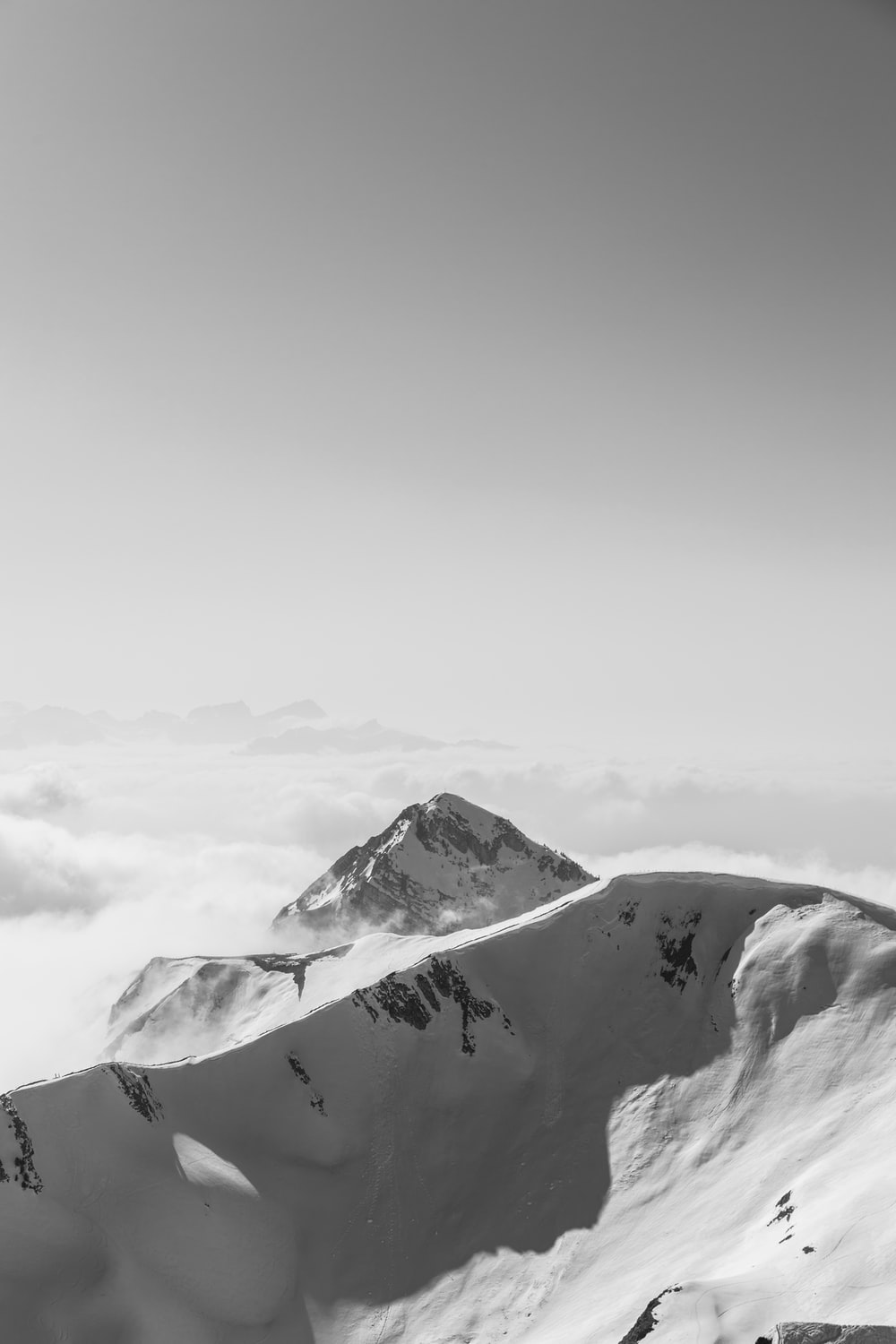 Snow Covered Mountains Under Black Cloudy Sky Wallpapers