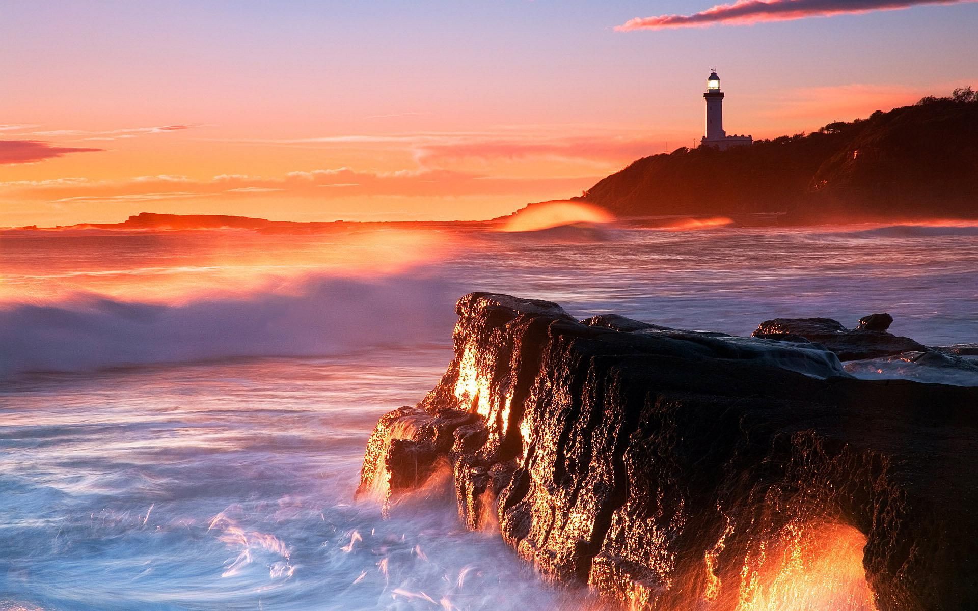 Surreal Sunrise Near Ocean Lighthouse Wallpapers