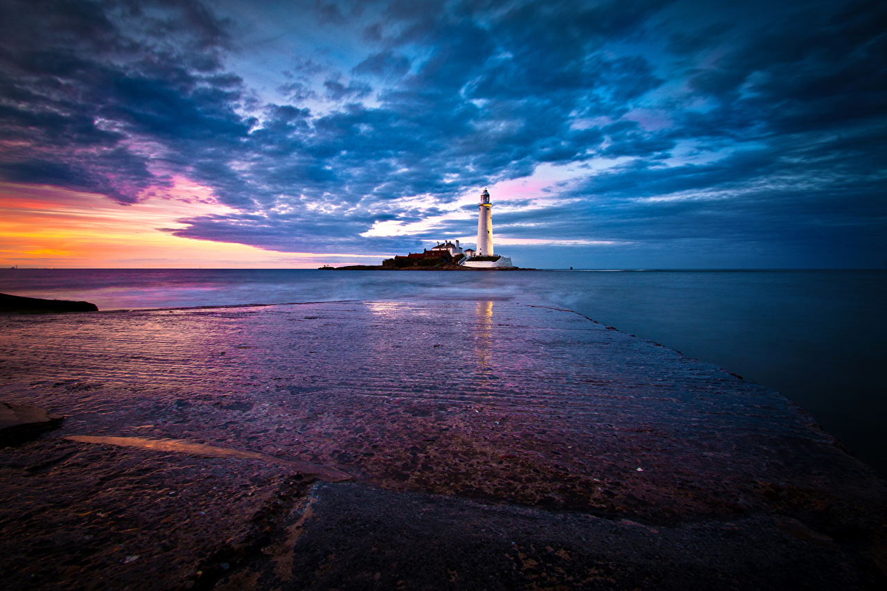 Surreal Sunrise Near Ocean Lighthouse Wallpapers