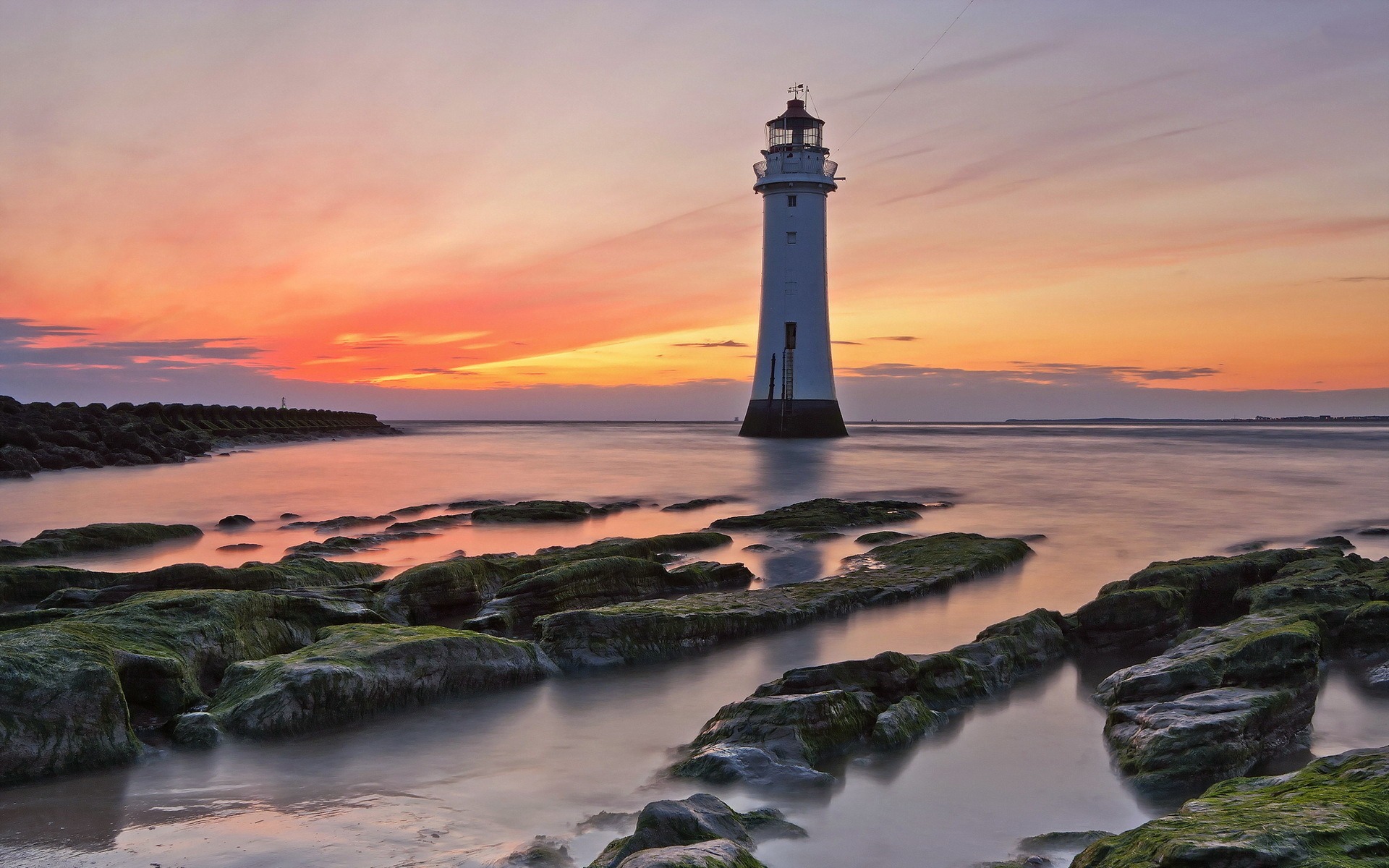 Surreal Sunrise Near Ocean Lighthouse Wallpapers