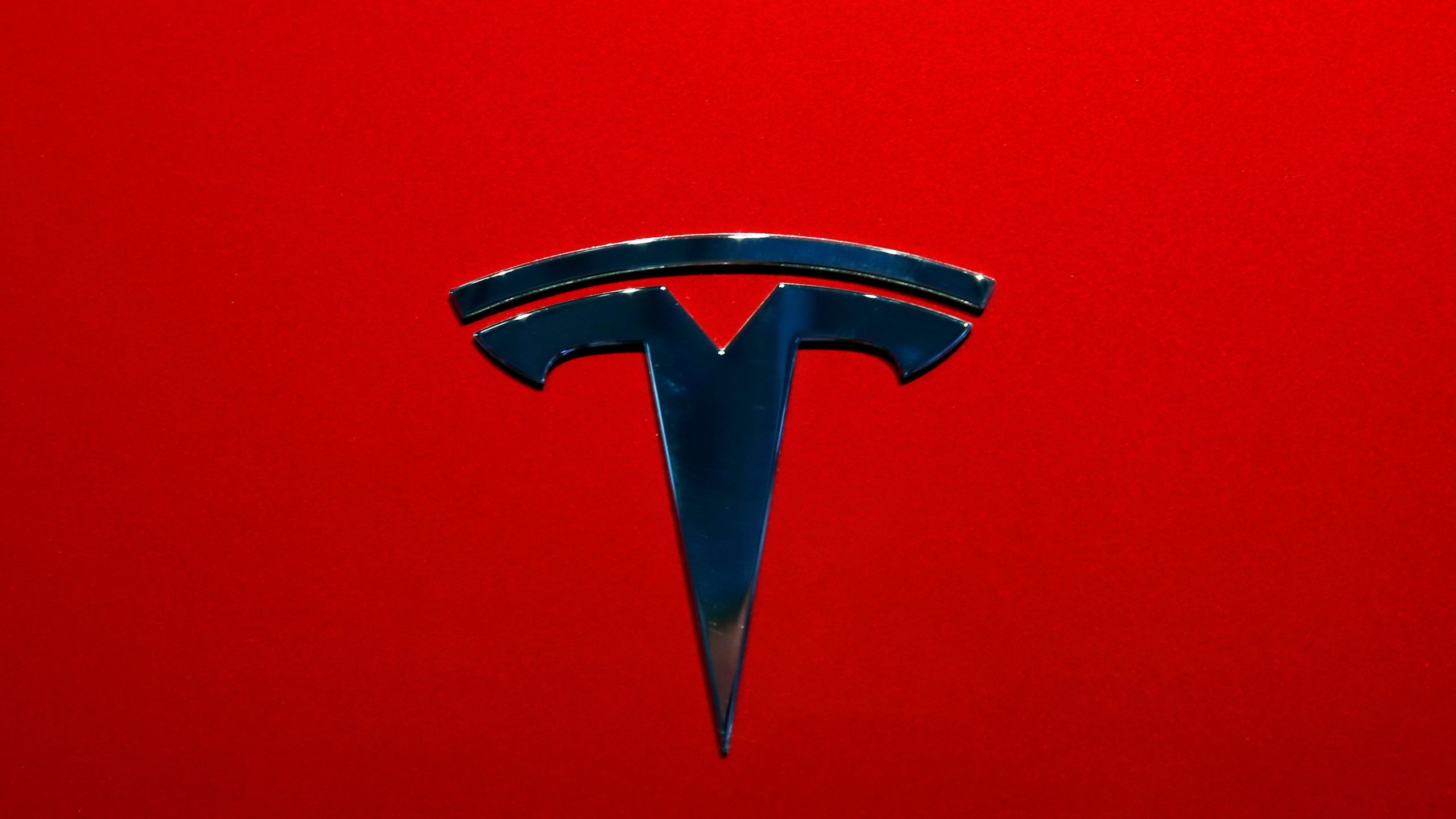 Tesla Logo Black Background