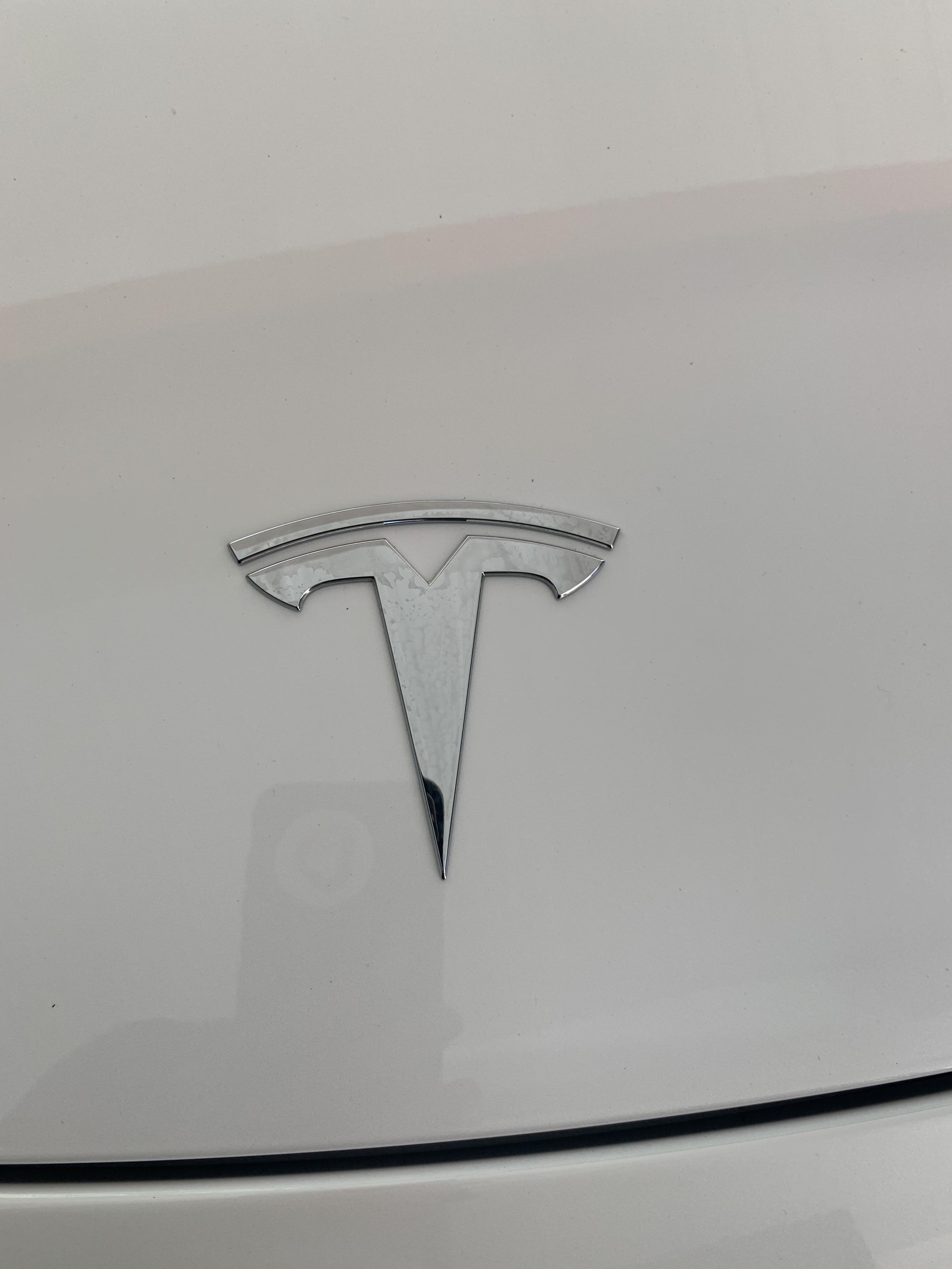 Tesla Logo Black Background