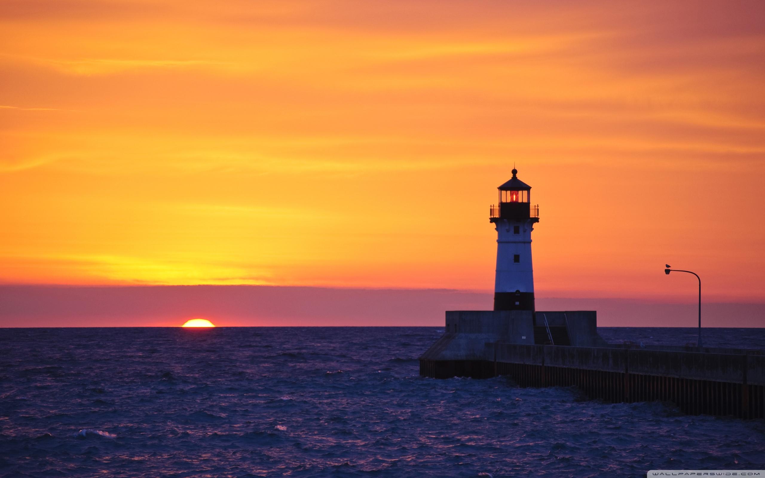 Yellow Sunset Near Lighthouse Wallpapers